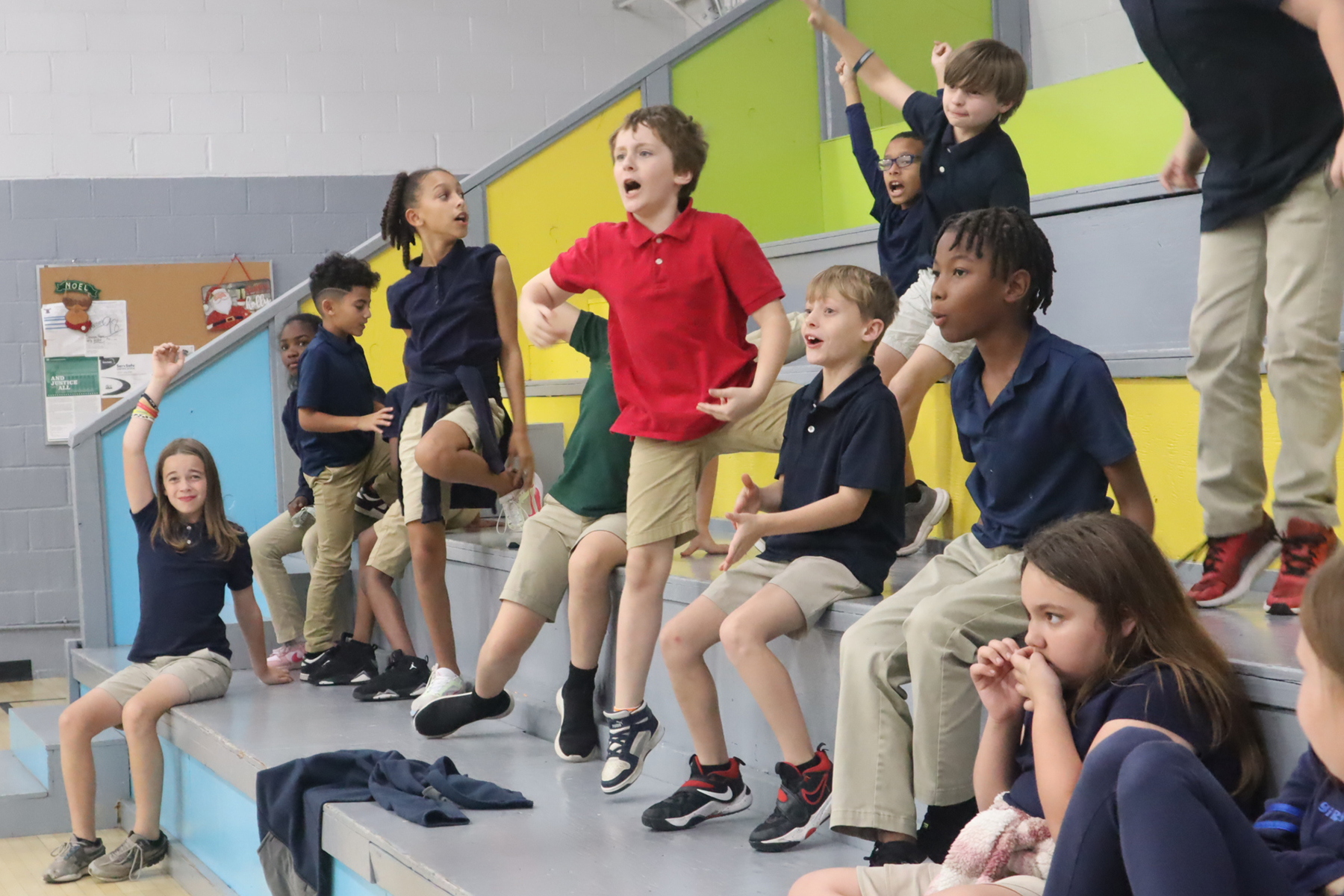 Club members cheering together in the Semmes gym
